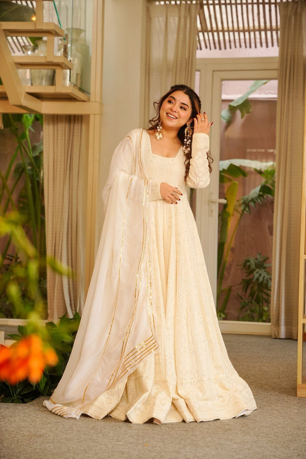 Elegant Off-White Soft Georgette Anarkali Suit with Heavy Sequins and Zari Embroidery